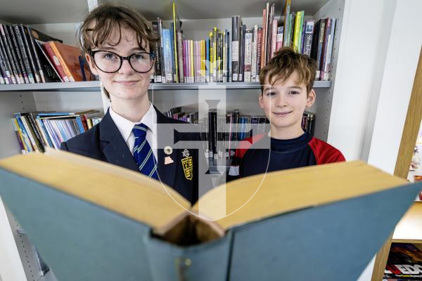 Picture by Peter Frankland. 25-11-25 Read-a-thon at Elizabeth College where students are encouraged to challenge themselves to read books while raising money for charity. L-R - Emily Garland, 13 and Henry Wilson, 11.