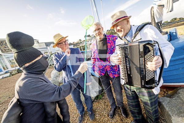 Picture by Sophie Rabey.  03-12-25.  I believe in Ormers, a christmas panto organised by people in Perelle.  
L-R Alison Vine, Jamie Le Friec, Gary Taylor and Paul Riley.