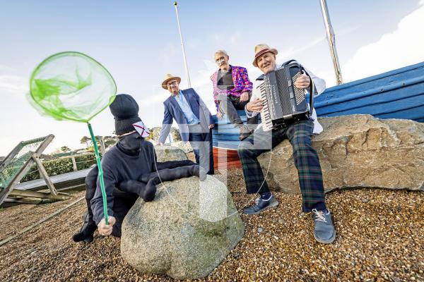 Picture by Sophie Rabey.  03-12-25.  I believe in Ormers, a christmas panto organised by people in Perelle.  
L-R Alison Vine, Jamie Le Friec, Gary Taylor and Paul Riley.