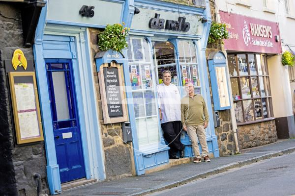 Picture by Peter Frankland. 10-12-25 One of St Peter Port's best known restaurants, Da Nello is closing next month when its co-owners retire. L-R - Tim Vidamour and Manuel Teixeira.
