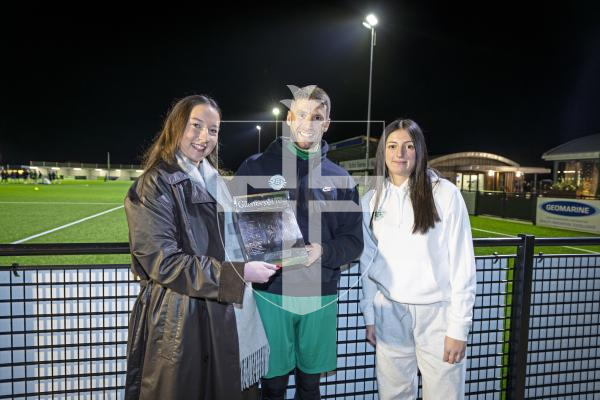 Picture by Peter Frankland. 16-12-25 Presentation of the Guernsey Press Sporting Achivement Of The Year trophy by Olivia Thompson to Muratti stars Ross Allen and Calleigh Hedley.