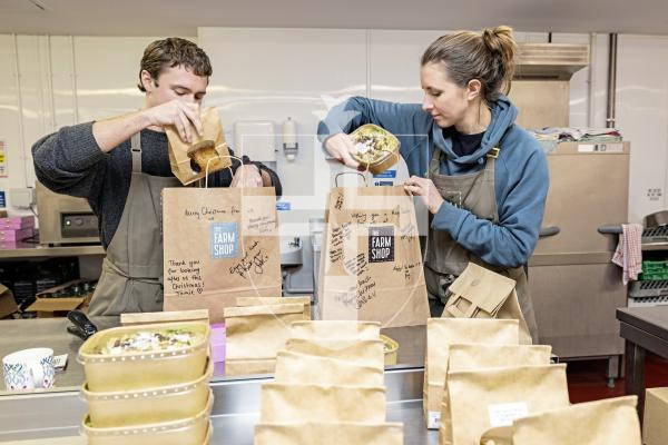 Picture by Sophie Rabey.  17-12-25.  The Farm Shop have started a 12 days of christmas initiative where they are gifting and delivering 240 meals to nursing and care staff thanks to a generous community donation.
L-R Jamie Etheridge and Sasha Marsh.