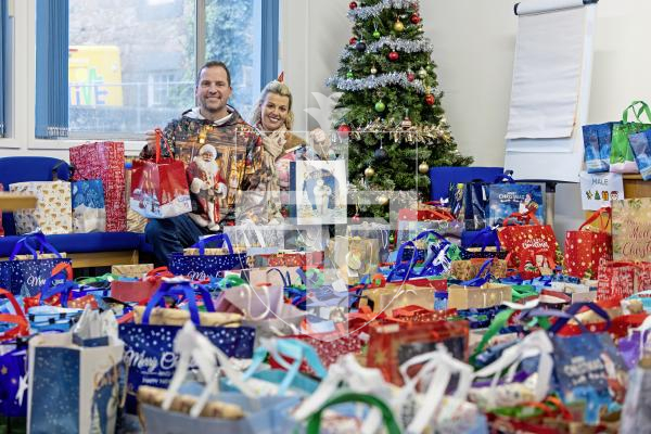 Picture by Peter Frankland. 17-12-25 Many bags of presents are now ready to be delivered community service users by the charity Gifts for the Elderly and Vunerable.