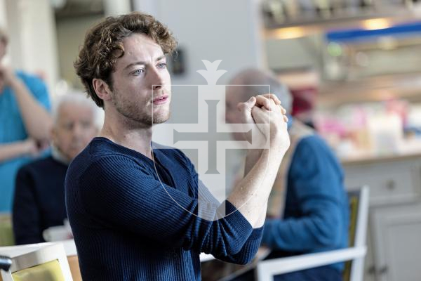 Picture by Peter Frankland. 19-12-25 Jersey Ballet troupe Ballet D'Jerri have been in the island to give two performances at the PRCPA but were today at Le Platon to do workshops with the residents there.  Donovan Delis-McCarthy warming up exercises with the residents.
