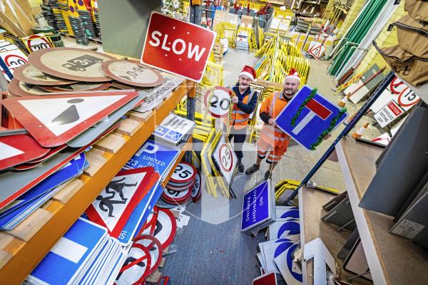 Picture by Peter Frankland. 22-12-25 At Christmas most of the States' road signs get a well deserved week off. L-R - Milton Le Moignan, Service Manager and Andy Brown, Signs and Lines Supervisor.