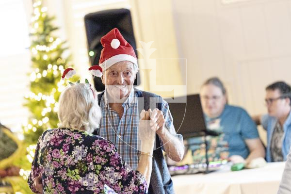 Picture by Sophie Rabey.  Picture Review of the Year 2025.  December.
We did not want to leave this dementia friendly, “Boogie in the Bar" party at The Penninsula Hotel, it was just magical.  The Christmas social event is organised by Dementia Friendly Guernsey was for people with dementia, their families and carers.  It was incredible to see everyone get up and enjoying the music, the moment it started!  Ron Gallienne is pictured enjoying a dance.
