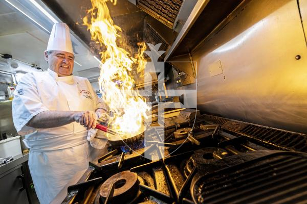 Picture by Peter Frankland. 22-12-25 Today is the final service at Da Nello. The restaurant is closing down as the co-owners retire. Head chef and co-owner Tim Vidamour frying some calamari.