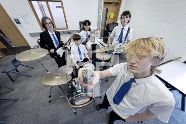 Picture by Peter Frankland. 14-01-26 Les Beaucamp school band Out of Sync are preparing to take to the stage at the Thirst Music Battle of the Bands. L-R - Sami Bamford, 14, Max Roger, 15, Marco Palmeri, 15, Josh Pailing, 15 and Bobby Broughton, 14.