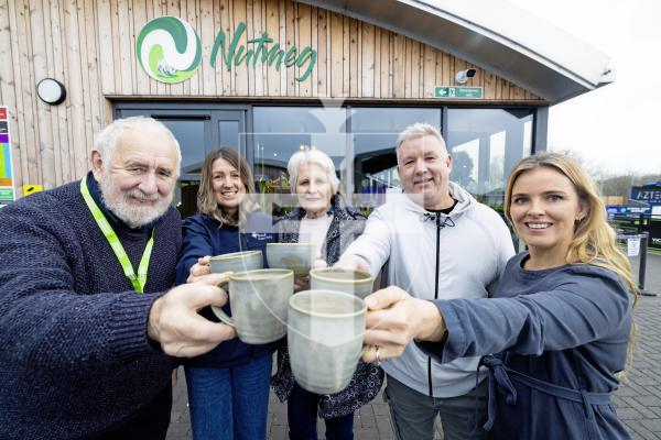 Picture by Peter Frankland. 14-01-26 Brew Monday is a charity event with Guernsey Mind, Healthcare Group, Samaritans and Victoria Park to help people overcome 'Blue Monday' by having a chat and a hot drink at Nutmeg, Victoria Park. L-R - Allan Harris, Samaritans, Lisa Ingrouille, Guernsey Mind, Ann Bessell, Samaritans, Rob Jones, Victoria Park and Dr Sally Richardson, Healthcare Group.