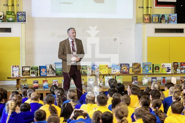 Picture by Sophie Rabey.  21-01-26.  St Martins Primary School held a special reading assembly to launch the National Year of Reading, a UK-wide campaign designed to inspire more people to make reading a regular part of their lives.
Deputy Paul Montague, Head of Education, Sport & Culture (ESC) spoke at the assembly.