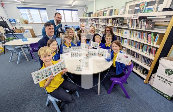 Picture by Sophie Rabey.  21-01-26.  St Martins Primary School held a special reading assembly to launch the National Year of Reading, a UK-wide campaign designed to inspire more people to make reading a regular part of their lives.
St Martins School Students L-R Guy Bartlett (8), Juno Bamford (8), Isak Le Huray (9), Heron Colmer (8), Brodi Smith (7), Alfie Longlais (7) and Verity McKerrell (7) with states, school and libary representatives.