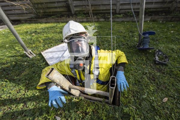 Picture by Peter Frankland. 17-02-26 George De Carteret of Drain Away has been working in the business for over twenty years. Here George is pictured donning breathing apparatus and climbing into a cesspit to check it for leaks.