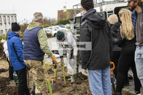 Picture by Sophie Rabey.  23-02-26.  Trees for Life held a tree planting session at at Styx Centre car park in St Peters.  Volunteers from OGH, J.P. Morgan and Julius Baer helped with the planting.
Andy McCutcheon giving a demonstration.