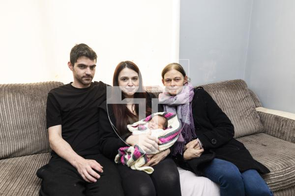 Picture by Sophie Rabey.  23-02-26.  Beth Sarre (middle) gave birth to her baby, Scarlett, in the car park to the PEH on Friday night after starting labour at home.  Beth's mother, Kerry helped deliver her granddaughter in the front seat of the car.
Scarlett with her parents L-R Brendan Topley and Beth Sarre with grandmother Kerry Sarre (right)