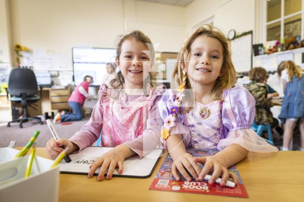 Picture by Sophie Rabey.  05-03-26.  World Book Day 2026 at Vauvert School.
L-R Millie Hammond (6) and Summer Phillips (5) are choosing which books they might like for their classroom.