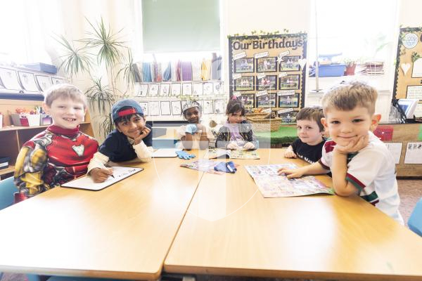 Picture by Sophie Rabey.  05-03-26.  World Book Day 2026 at Vauvert School.
L-R Jaxon McMahon (5), Ibraheem Subhan (6), Marzuqah Sikiru (5), Sophia Kenneally (6), Theo McCarey (5) and Dougie Setters (5) are choosing which books they might like for their classroom.
