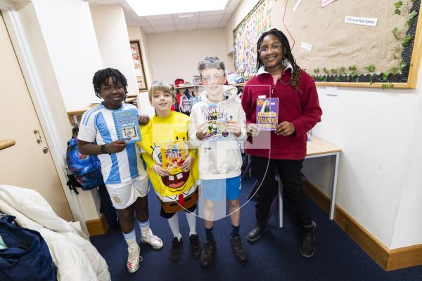 Picture by Sophie Rabey.  05-03-26.  World Book Day 2026 at Vauvert School.
Year 6 students L-R Kashmar Reid (11), William Crawford (11), Max Le Masurier (10) and Oprah Moyo (11) with their current reading books.