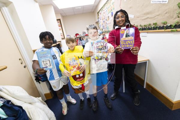 Picture by Sophie Rabey.  05-03-26.  World Book Day 2026 at Vauvert School.
Year 6 students L-R Kashmar Reid (11), William Crawford (11), Max Le Masurier (10) and Oprah Moyo (11) with their current reading books.