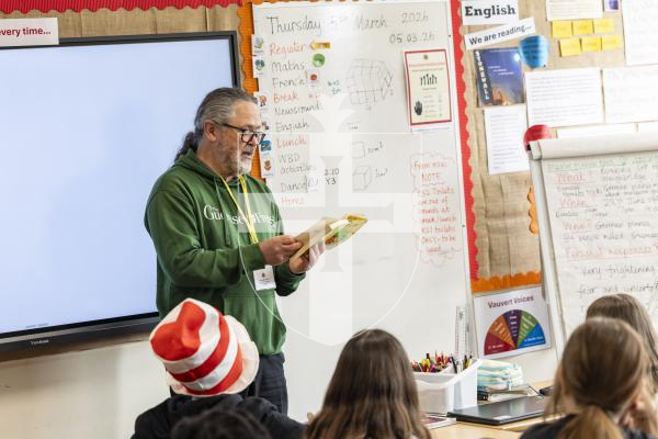 Picture by Sophie Rabey.  05-03-26.  World Book Day 2026 at Vauvert School.
GP Reporter, Simon De La Rue appeared as a 'mystery reader' and read the class a chapter of Mr Gum (Author: Andy Stanton).