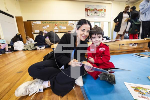 Picture by Sophie Rabey.  05-03-26.  KMPG continue to support early reading skills for young learners of World Book Day.  They have been supporting Amherst Primary Schools for many years and visit the school every week to provide one-to-one reading support.  Today they opened up the school hall to allow students to bring in their parents and enjoy time to read together.
L-R Nicole Figgins with her son Freddie Figgins (5)