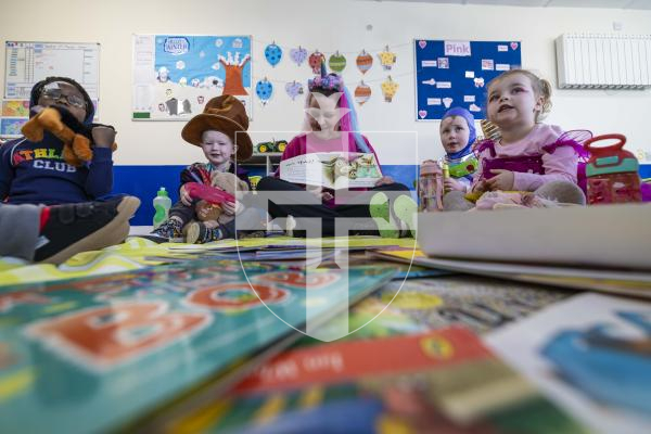 Picture by Peter Frankland. 05-03-26 World Book Day at Little Learners Day Nursery. Kelly Eborall reads to the children at their Teddy Bears Picnic.