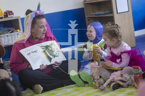 Picture by Peter Frankland. 05-03-26 World Book Day at Little Learners Day Nursery. Kelly Eborall reads to the children at their Teddy Bears Picnic.