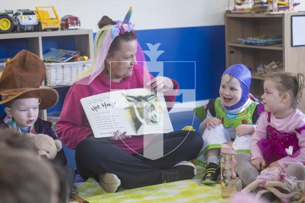 Picture by Peter Frankland. 05-03-26 World Book Day at Little Learners Day Nursery. Kelly Eborall reads to the children at their Teddy Bears Picnic.