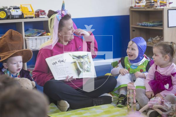 Picture by Peter Frankland. 05-03-26 World Book Day at Little Learners Day Nursery. Kelly Eborall reads to the children at their Teddy Bears Picnic.