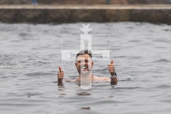 Picture by Sophie Rabey.  07-03-26.  Harry Beattie, commonly known on social media as 'Ice Bath Harry', was in Guernsey and took an ice bath and plunge in the bathing pools.  He is a recovering drug addict who has started using ice baths daily to help with his sobriety and mental health.  He films the videos and has a big following.