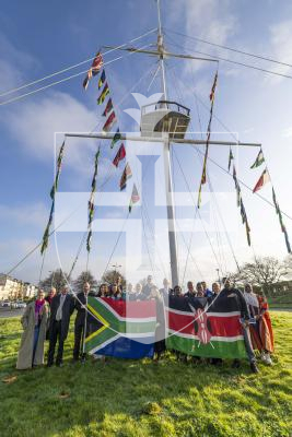 Picture by Peter Frankland. 09-03-26 Commonwealth Day flag raising at Weighbridge Roundabout. Group shot with South African and Kenyan flags.