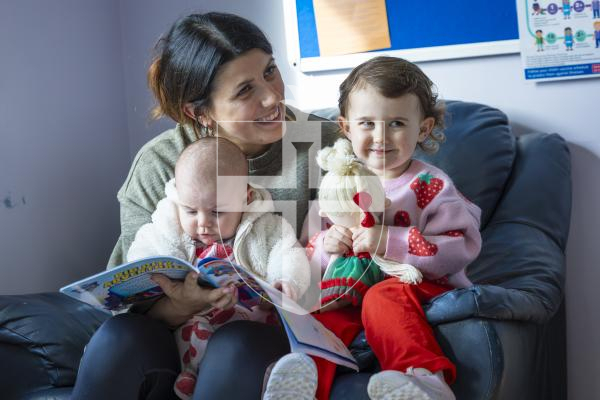 Picture by Peter Frankland. 11-03-26 Kindred Family Hub at Les Genats Estate. They are launching a project called 'Screens Away, Let's Play' which encourages youngester and parents to put their devices away and engage in real play. Rachael Pearce with her daughters Meabh Quinn, 4mts and Millie Quinn, 2
