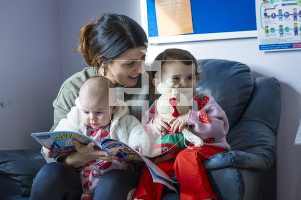 Picture by Peter Frankland. 11-03-26 Kindred Family Hub at Les Genats Estate. They are launching a project called 'Screens Away, Let's Play' which encourages youngester and parents to put their devices away and engage in real play. Rachael Pearce with her daughters Meabh Quinn, 4mts and Millie Quinn, 2