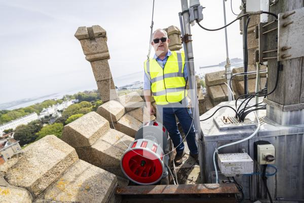 Picture by Sophie Rabey.  26-04-26.  A new siren has been fit onto the top of Victoria Tower this weekend.  
Jason Dodd from the States Property Unit.