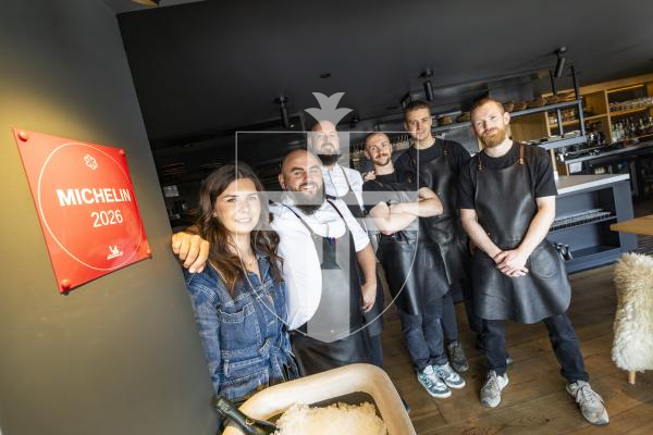 Picture by Sophie Rabey.  30-04-26.  Vraic have recieved their offical Michelin Star plaque that they have put up inside the restraurant.
L-R Hollie Davies, Nathan Davies, Kuba, Ben Holland, Max Davies and Sam Munstermann.