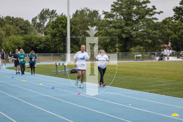 Picture by Sophie Rabey.  05-07-26.  As part of Headway Guernsey’s 20th anniversary celebrations they held a Mighty Mile at Footes Lane for people of all abilities to cover some distance around the track and raise money for the charity.  Supported by Ravenscroft Construction.