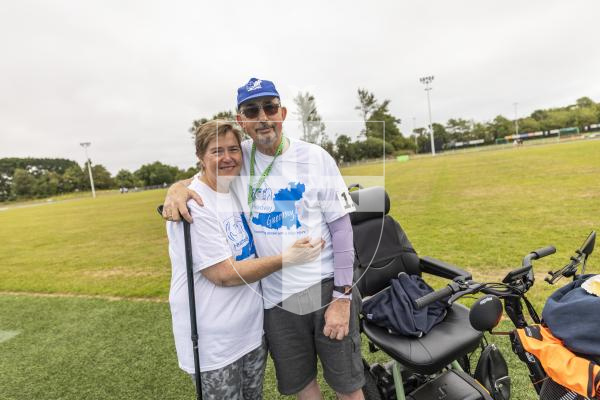 Picture by Sophie Rabey.  05-07-26.  As part of Headway Guernsey’s 20th anniversary celebrations they held a Mighty Mile at Footes Lane for people of all abilities to cover some distance around the track and raise money for the charity.  Supported by Ravenscroft Construction.
Mike Spiller (right) and his wife Liz took part this morning.  Mike has been using Headways services weekly for the last few years.