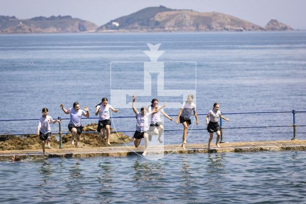Picture by Sophie Rabey.  17-07-26.  Vauvert Year 6 leavers annual tradition of jumping in the bathing pools on their last day of Primary School.