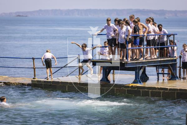 Picture by Sophie Rabey.  17-07-26.  Vauvert Year 6 leavers annual tradition of jumping in the bathing pools on their last day of Primary School.