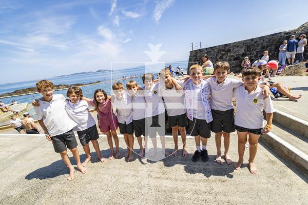 Picture by Sophie Rabey.  17-07-26.  Vauvert Year 6 leavers annual tradition of jumping in the bathing pools on their last day of Primary School.