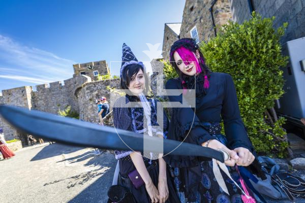 Picture by Peter Frankland. 23-08-26 Castle Cornet Fete d'Etai. L-R - Charlotte Lee and George Green came dressed for the occasion.
