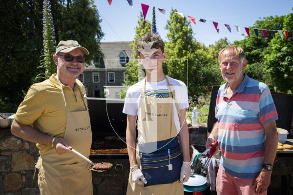Pictured by Connor Rabey. 01/06/2024. 
St Peters Hidden Gardens, hosted by the Parish Church and supported by Rocq Capital.
Cooking and serving the food from the BBQ. L-R Phil Duquemin, Pierre Datta, John Elliott.