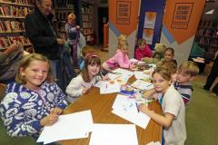 Pic by Tom Tardif 27-10-16.
Guille-Alles Library, Market Square, St Peter Port.
GP Ted - Design a Bookmark competition with the Guernsey Literary Festival.
Around the table L/R: Molly Robinson, 10, Holly Lavin, 5, Jamie Lavin, 4, Imala Bearder, 5, Solomon Bearder, 3, Savannah Collins, 9, Freya Renouf, 7, Harry Strappini, 6 and Lily Strappini, 9.