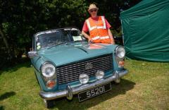 Pic supplied by Andrew Le Poidevin: 15-06-2025.
The 2025 Guernsey Classic Vehicle Club show at Saumarez Park. Event organiser John Bichard with his Austin A40.