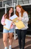 Photo by Andrew Le Poidevin, 21-08-2025. The 2025 GCSE Results collection at La Mare De Carteret High School. Amelie May Jehan, Hollie Archenoul.