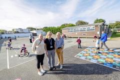 Picture by Sophie Rabey.  16-09-25.  La Mare De Carteret Primary School have had some new playground markings added over the summer break.  It was funded through the schools PTA and the Health Improvement Commission, with the hope to increase physical activity amongst the pupils and help their confidence on bikes etc.
L-R Kate Winter (PTA), Juliet Ford (Deputy Head Teacher) and Alex Costen (Health Improvement Commission)