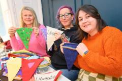 Pic supplied by Andrew Le Poidevin, 08-02-2025. Liberate's Art Club meet at the Community Cafe in Mill Street to make colourful bunting for Guernsey's 80th Liberation Day on May 9th 2025. Claire Gray, Diana Hurwitz and Beth Brown.