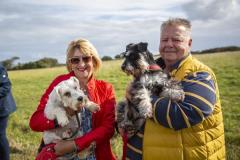 Picture by Luke Le Prevost. 23-09-23.
Schnauzer owners brought their dogs to Pleinmont for the Schnauzerfest charity event to meet up and walk together. L-R Bev Torode with Lola and Paul Renouf with Alfie