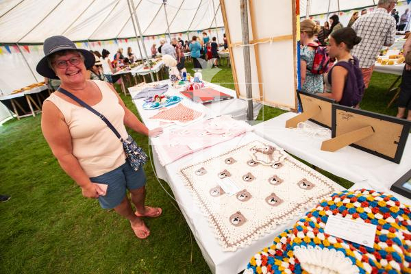 Picture by Sophie Rabey.  23-08-23.  First day of the North Show at Saumarez Park.
Karen Hudson with her crochet blanket entries.