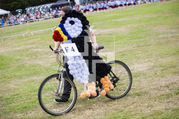 Picture by Sophie Rabey.  24-08-23.  North Show 2023, Battle of Flowers.
Class F - Decorated bicycles, any flowers, any age.
F4 Jet the Puffin - Hayley Le Page