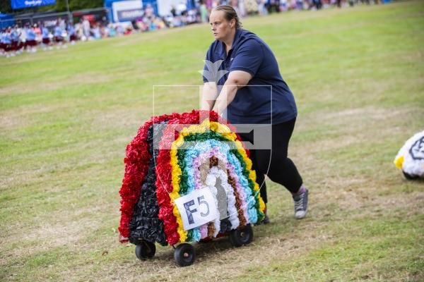 Picture by Sophie Rabey.  24-08-23.  North Show 2023, Battle of Flowers.
Class F - Decorated bicycles, any flowers, any age.
F5 Rainbow Covid 19 - Leah Peck